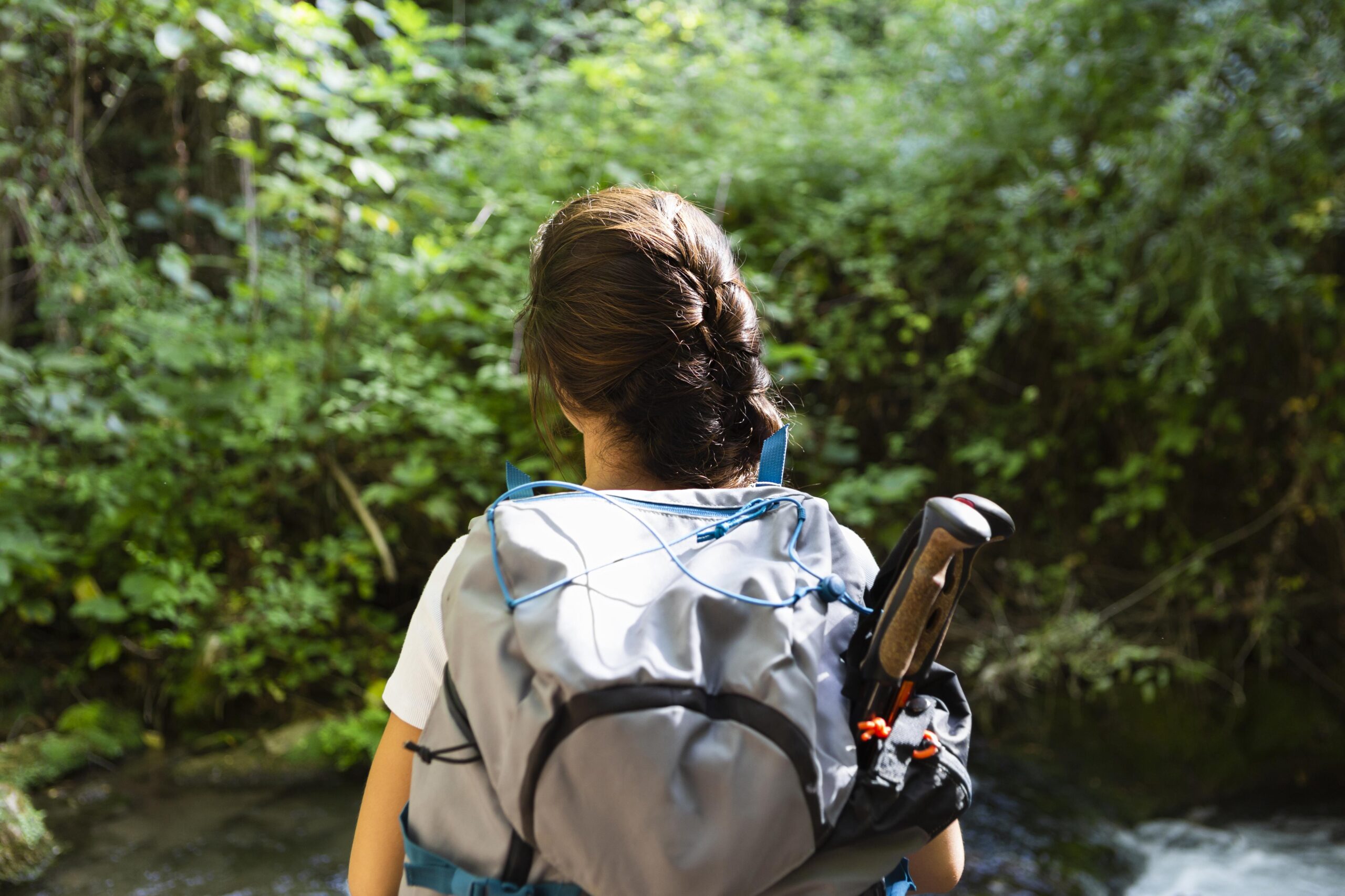 back-view-woman-with-backpack-exploring-nature-scaled